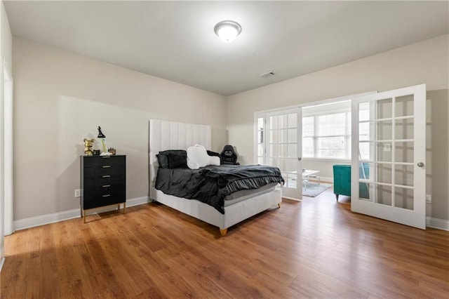 3642 Princeton Ave, Atlanta, GA 30337 - bedroom with wood finished floors and baseboards