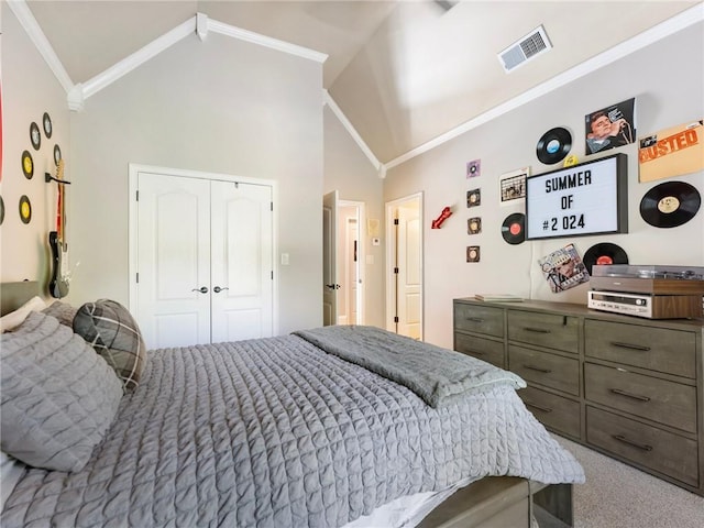 bedroom with crown molding, carpet, high vaulted ceiling, and a closet