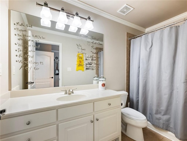 bathroom with ornamental molding, toilet, and vanity