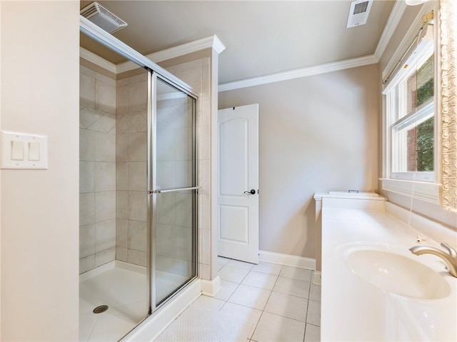 bathroom with walk in shower, tile patterned floors, ornamental molding, and vanity