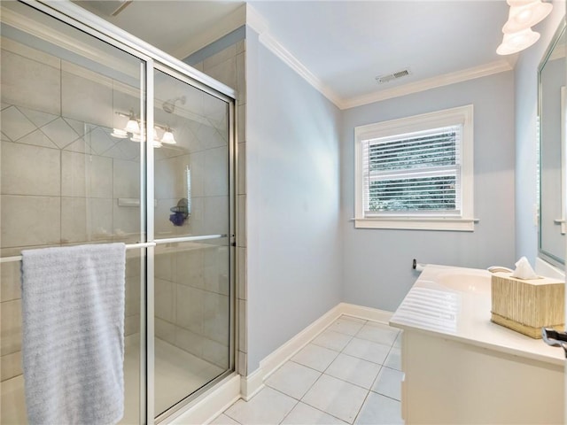 bathroom featuring crown molding, vanity, an enclosed shower, and tile patterned flooring