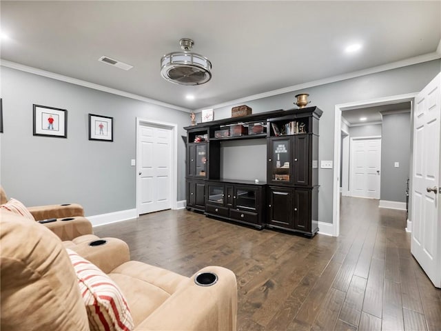 living room featuring crown molding and dark hardwood / wood-style floors