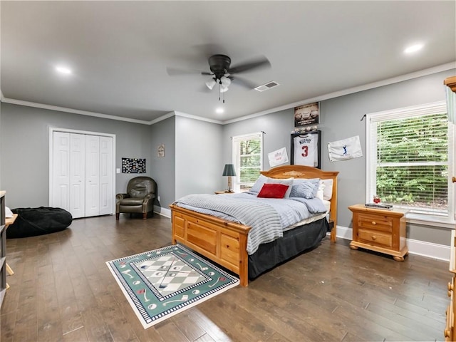 bedroom featuring ornamental molding, ceiling fan, and dark hardwood / wood-style flooring