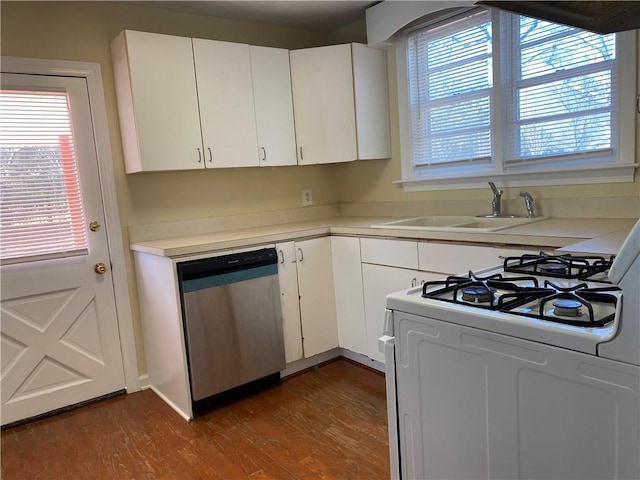 kitchen featuring dishwasher, white gas range, sink, white cabinets, and dark wood-type flooring