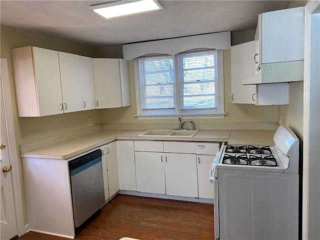 kitchen with stainless steel dishwasher, sink, white range with gas stovetop, and white cabinets