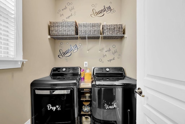 laundry room with laundry area and separate washer and dryer