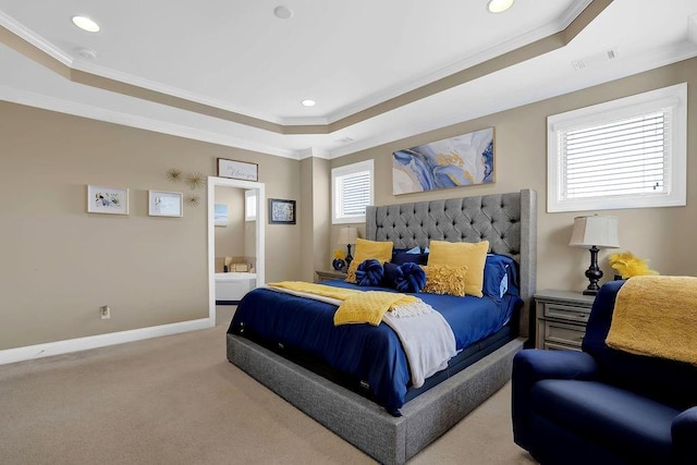 bedroom with visible vents, a raised ceiling, and crown molding