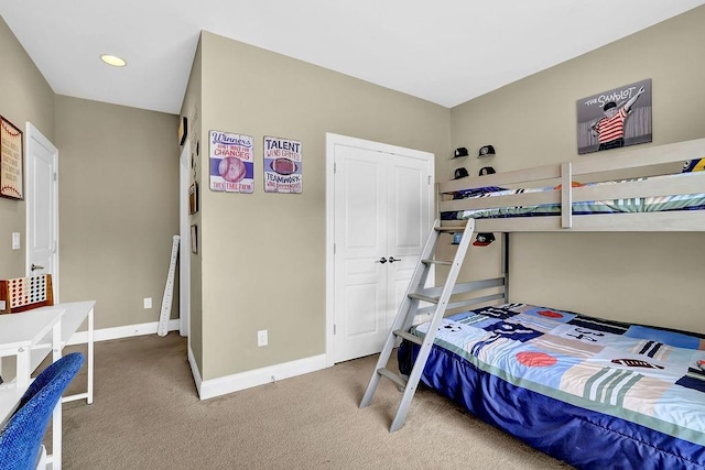 bedroom featuring carpet, a closet, baseboards, and recessed lighting