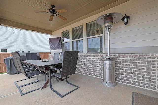 view of patio featuring outdoor dining space and ceiling fan