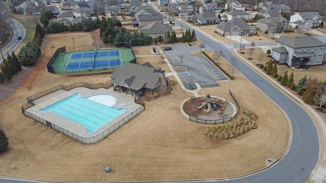 view of pool with a residential view