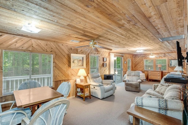 4937 Goddards Ford Rd, Gainesville, GA 30504 - carpeted living area with wooden ceiling, wood walls, and ceiling fan