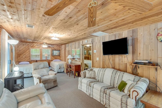 4937 Goddards Ford Rd, Gainesville, GA 30504 - carpeted living area with wood ceiling, wooden walls, and ceiling fan