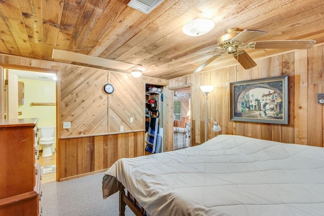 4937 Goddards Ford Rd, Gainesville, GA 30504 - bedroom with wooden ceiling, wood walls, connected bathroom, and a closet