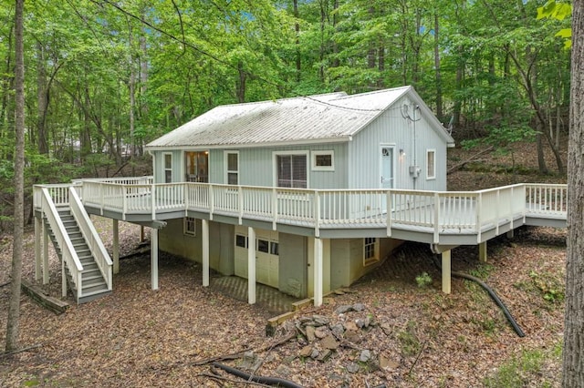 4937 Goddards Ford Rd, Gainesville, GA 30504 - back of house with a wooden deck, a metal roof, stairs, and a wooded view