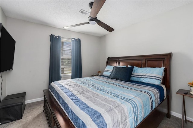200 Robin Hood Ln, Hampton, GA 30228 - carpeted bedroom with ceiling fan and a textured ceiling