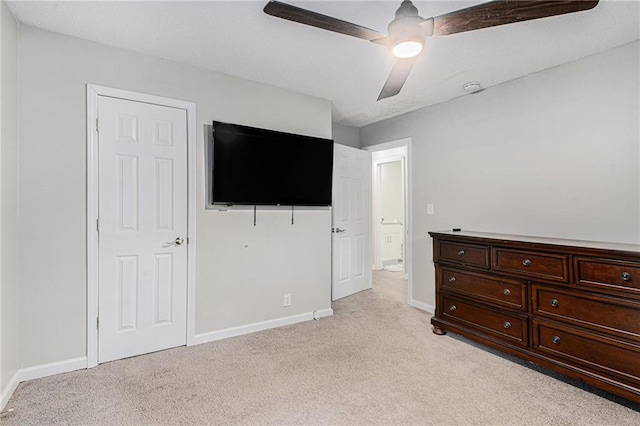 200 Robin Hood Ln, Hampton, GA 30228 - bedroom with light carpet and a ceiling fan