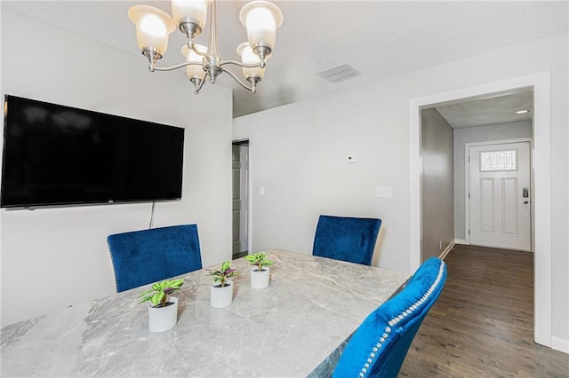 200 Robin Hood Ln, Hampton, GA 30228 - dining area with wood finished floors and a chandelier