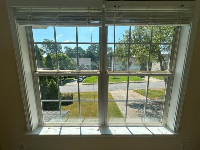 doorway to outside featuring a wealth of natural light