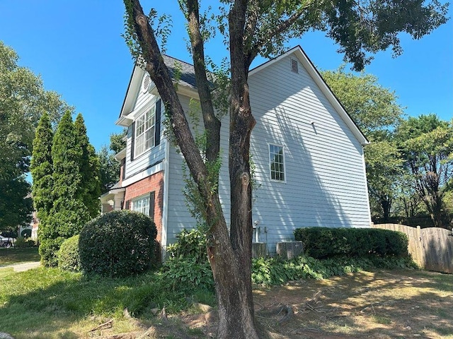 view of property exterior with cooling unit