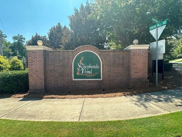 view of community sign