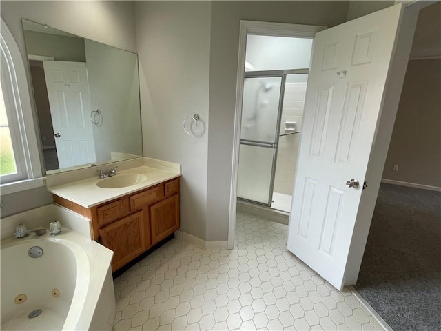 7123 Woodridge Ln, Union City, GA 30291 - bathroom with a shower stall, vanity, and a whirlpool tub