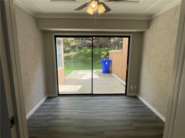 7123 Woodridge Ln, Union City, GA 30291 - empty room featuring a textured wall, wood finished floors, and a ceiling fan