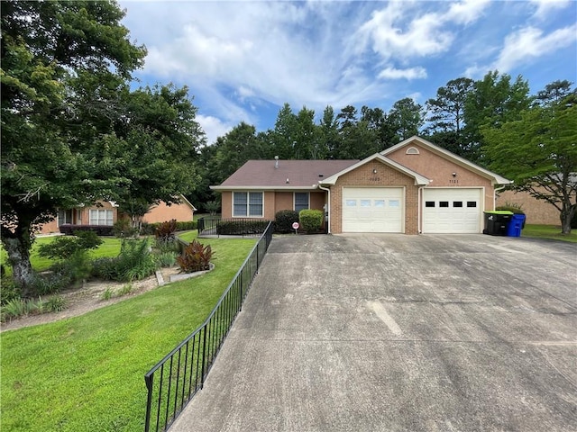 7123 Woodridge Ln, Union City, GA 30291 - view of front of house with an attached garage, concrete driveway, and brick siding
