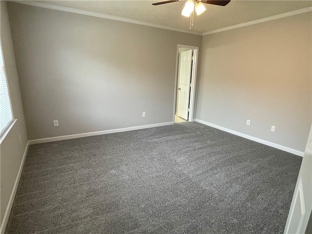 7123 Woodridge Ln, Union City, GA 30291 - spare room with ceiling fan, crown molding, dark carpet, and a textured ceiling