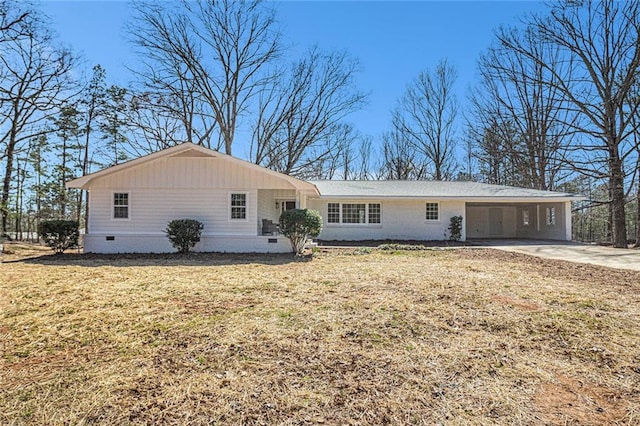 9640 Cedar Grove Rd, Fairburn, GA 30213 - ranch-style house featuring crawl space, driveway, an attached carport, and a front lawn