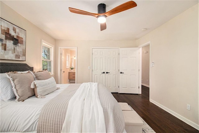 9640 Cedar Grove Rd, Fairburn, GA 30213 - bedroom with baseboards, dark wood-style floors, ensuite bath, a closet, and a ceiling fan