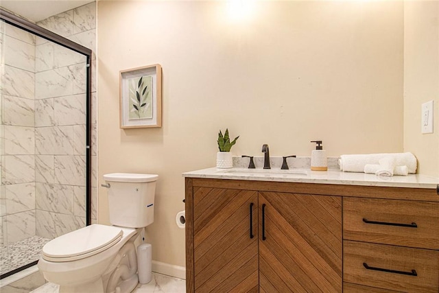 9640 Cedar Grove Rd, Fairburn, GA 30213 - bathroom with marble finish flooring, toilet, a shower stall, vanity, and baseboards