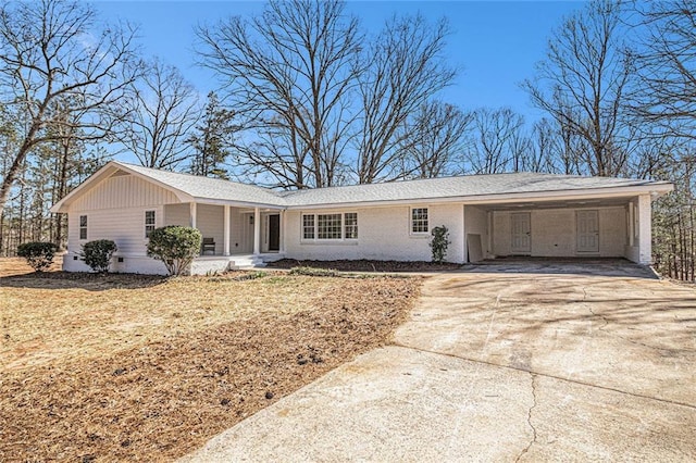 9640 Cedar Grove Rd, Fairburn, GA 30213 - ranch-style home with driveway, a carport, and brick siding