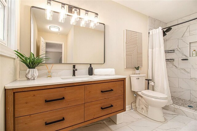 9640 Cedar Grove Rd, Fairburn, GA 30213 - full bath featuring marble finish flooring, toilet, vanity, and tiled shower