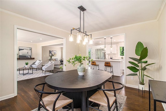 9640 Cedar Grove Rd, Fairburn, GA 30213 - dining area featuring dark wood finished floors, crown molding, and baseboards