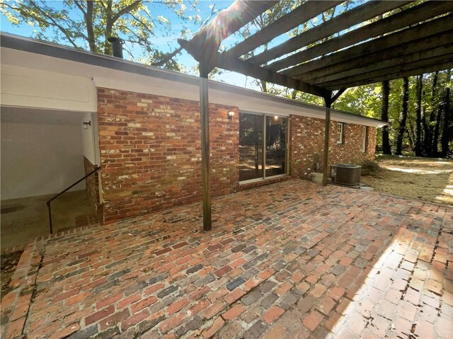 view of patio with a pergola and central air condition unit