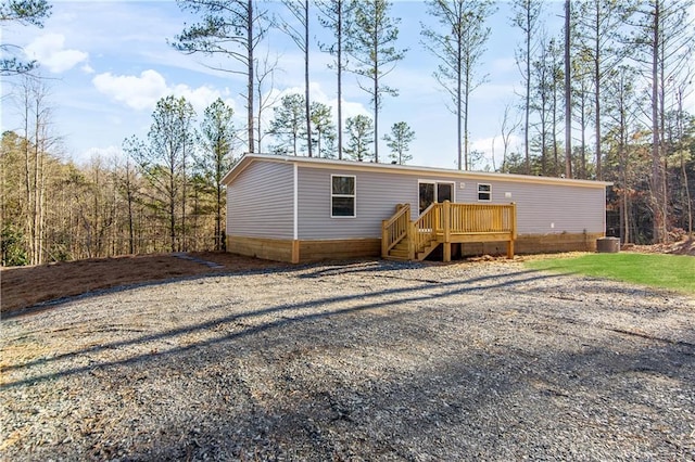 rear view of house with a deck