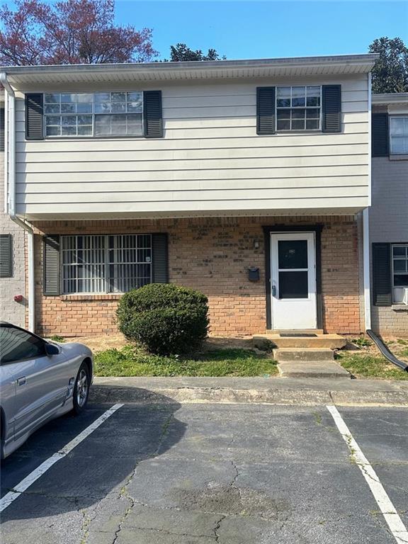 4701 Flat Shoals Rd, Union City, GA 30291 - multi unit property featuring brick siding and uncovered parking