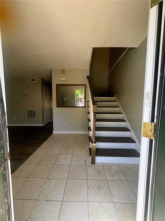 4701 Flat Shoals Rd, Union City, GA 30291 - stairs with baseboards and a textured ceiling