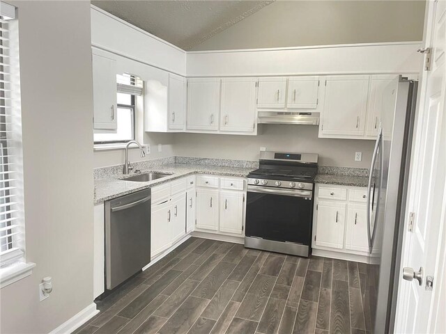 unfurnished bedroom featuring dark wood finished floors, a closet, visible vents, a textured ceiling, and baseboards