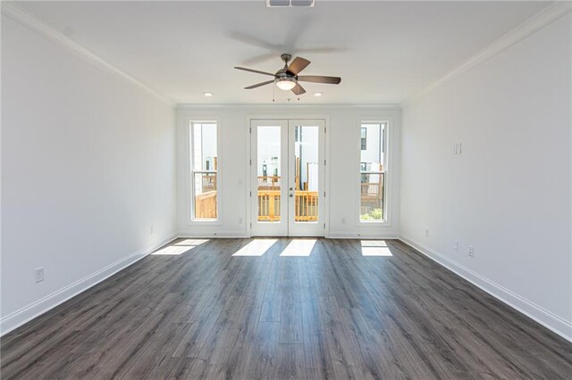 unfurnished room featuring french doors, ceiling fan, ornamental molding, and dark hardwood / wood-style floors