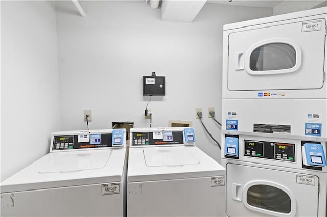 1280 W Peachtree St NW Unit 810, Atlanta, GA 30309 - shared laundry area featuring stacked washer and dryer and washing machine and dryer