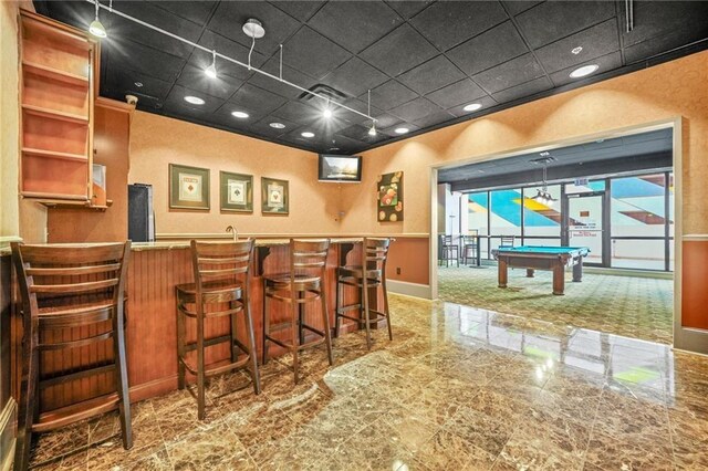 1280 W Peachtree St NW Unit 810, Atlanta, GA 30309 - bar with visible vents, refrigerator, baseboards, a community bar, and billiards