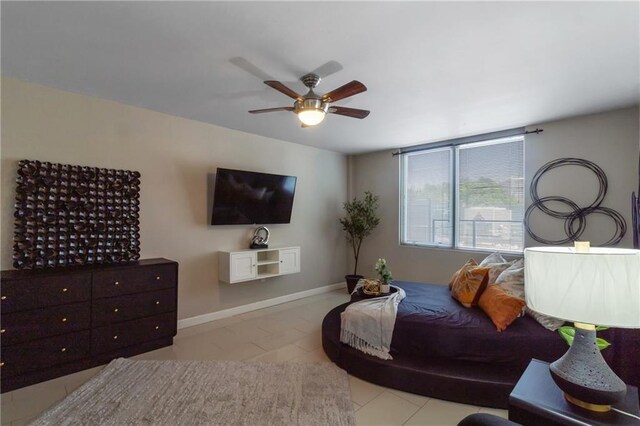 1280 W Peachtree St NW Unit 810, Atlanta, GA 30309 - tiled bedroom featuring ceiling fan