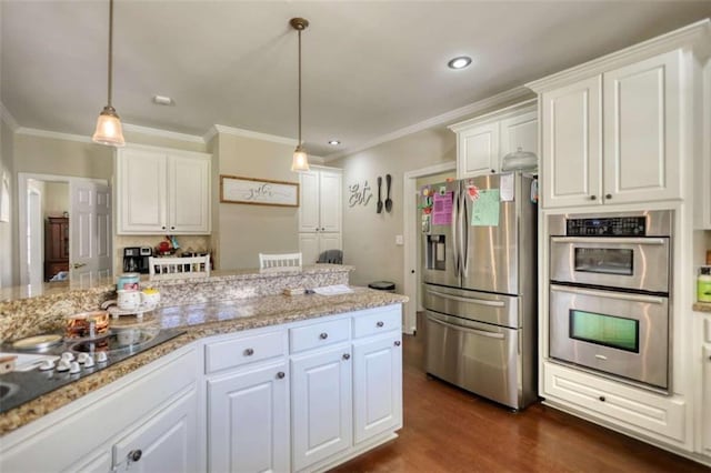 kitchen with white cabinetry, hanging light fixtures, stainless steel appliances, and dark wood-style floors