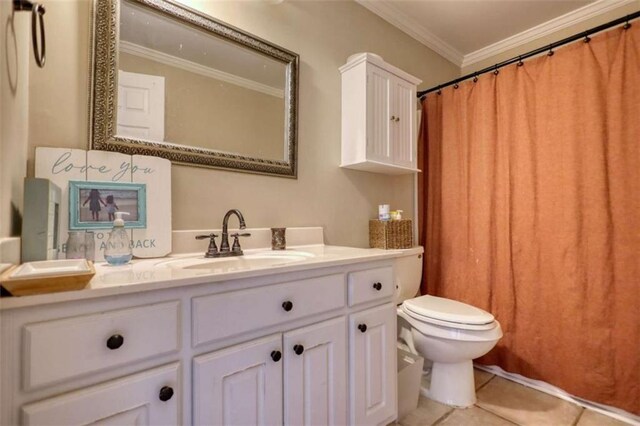 bathroom with vanity, toilet, tile patterned flooring, and crown molding