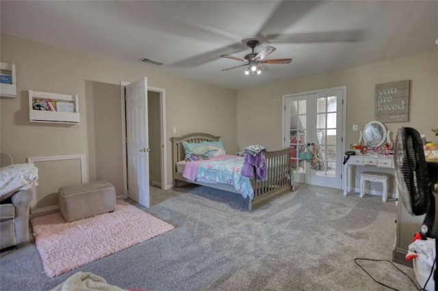 bedroom featuring baseboards, visible vents, carpet floors, and a ceiling fan