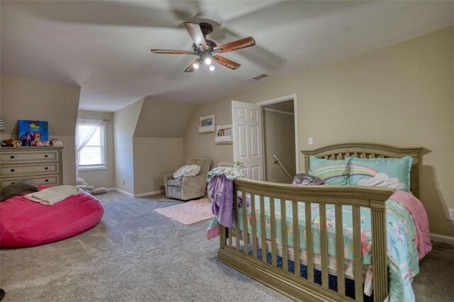 carpeted bedroom featuring baseboards, visible vents, ceiling fan, and lofted ceiling