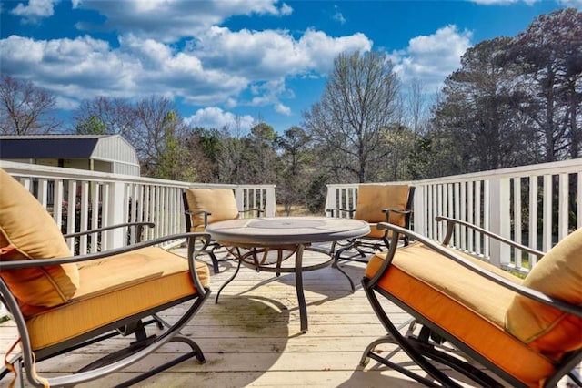 view of wooden balcony featuring a deck