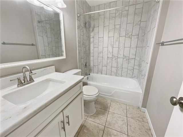 full bath featuring baseboards, toilet, tile patterned floors, vanity, and shower / bathing tub combination