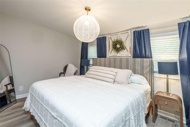 bedroom featuring hardwood / wood-style floors